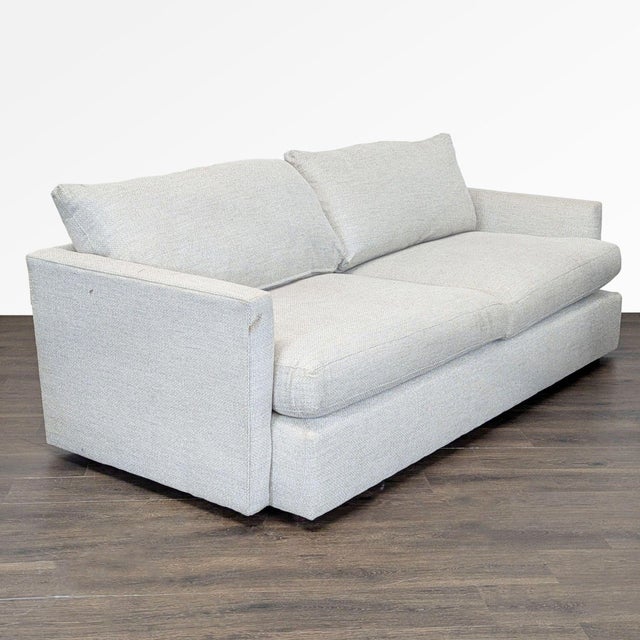 This Crate & Barrel 3-seat sofa is perfect for any living space. It features a modern, straight-arm design and a soft...