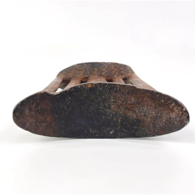 Ethiopian headrests come in various forms. They range from simple to elaborately carved artifacts. They have abstract...
