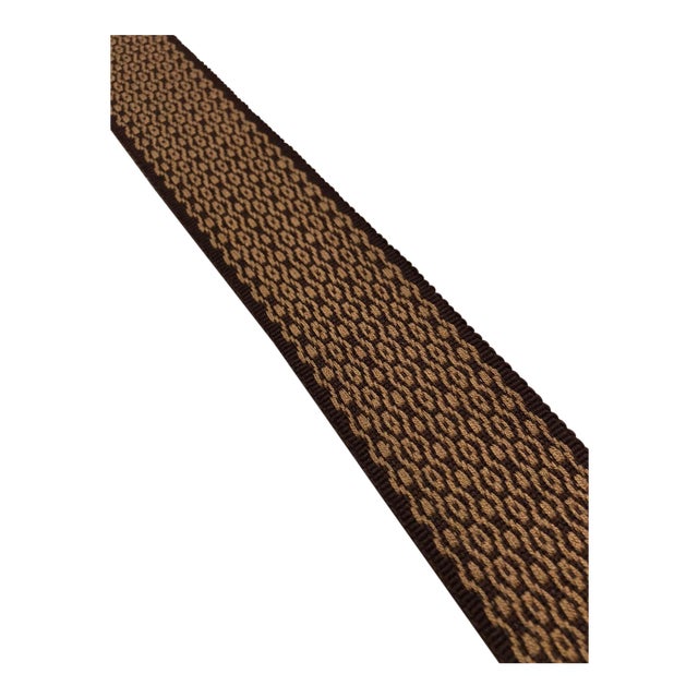 This warm earthy fabric trim makes a beautiful embellishment on drapes, pillows, or furniture. Pricing is firm, this trim...