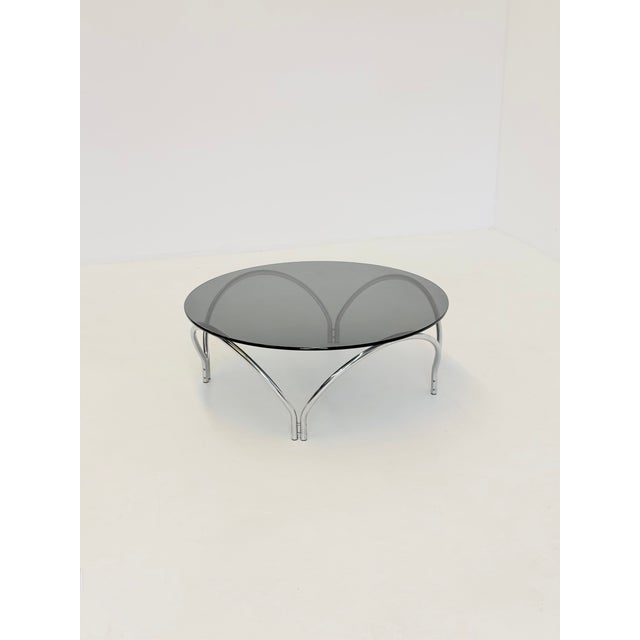 This round vintage coffee table is a characteristic example of the Space Age and Mid Century Modern style from the 1970s ....