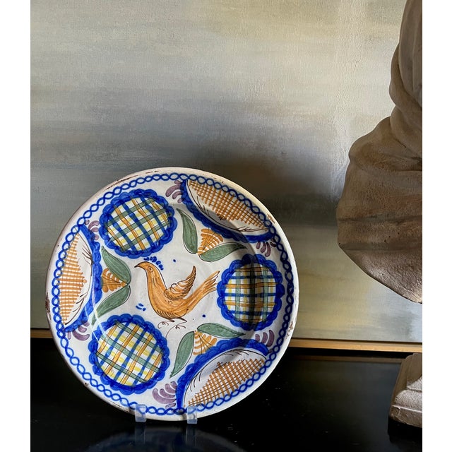 Large faience plate / bowl made in Spain in the early 20th century. Hand painted with the painters initials on the reverse.