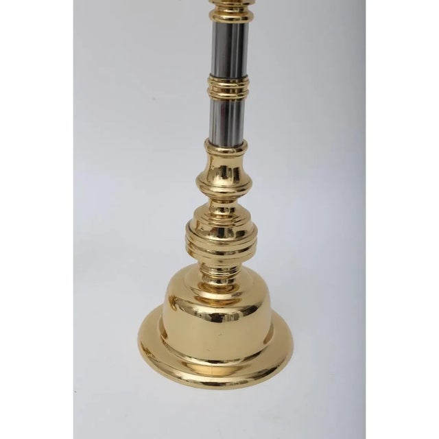 This stylish set of candlesticks date to the 1970s and with their mixed metals they can work in many interiors. The set...