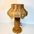 This is a large Tramp Art Table Lamp. It’s from the 1940s and Folk Art crafted from wood popsicle sticks. The sticks are...