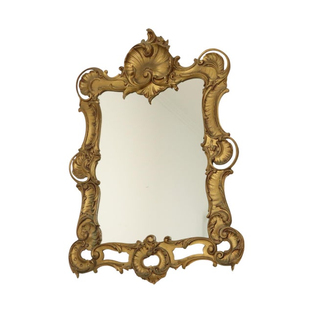 Beautiful crested mirror made of gold-colored polyresin, a type of hard plastic, entirely in classic Rococo style, Italy,...