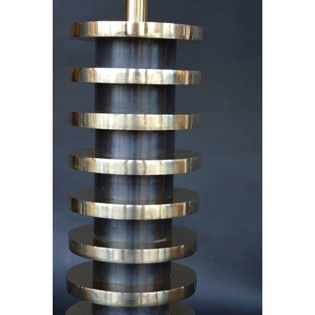 Pair of brass lamps in the manner of Donald Deskey.