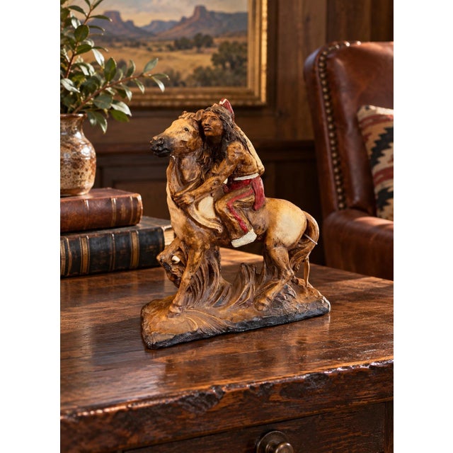 This is a lovely handmade sculpture of an American Indian on Horseback. Most likely made in the 1960s, it displays the...