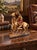This is a lovely handmade sculpture of an American Indian on Horseback. Most likely made in the 1960s, it displays the...