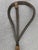 Antique woven wire and wood primitive rug beater. Marked Hercules. Good condition with wear consistent with age. It...