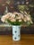 Very unique tall scalloped pottery vase painted simply with berries. Makes a great impression on display or filled with...