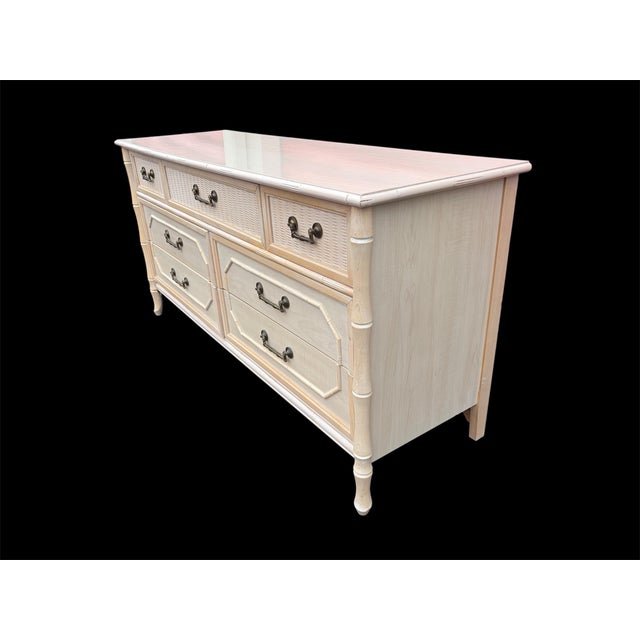 Classic Coastal /boho chic style 7 drawer low dresser made by Broyhill furniture. 60” wide. A wonderful mixed example...