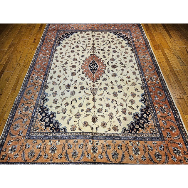 "This beautiful vintage Tabriz-design room-size rug, hand-knotted in Pakistan during the fourth quarter of the 20th...
