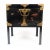 Japanese black lacquered wood trunk with engraved cast brass corner mounts and bails for the lift off cover. The brasses...