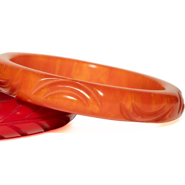 Red Vintage Carved Bakelite Bangle Bracelets in Red and Orange, 1930's, Pair Of For Sale - Image 8 of 17