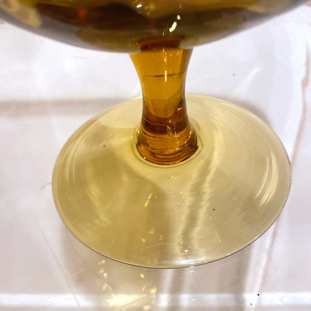 A gorgeous MCM amber snifter or compote with the optic stripe design. Made in Italy sticker is not present. This art glass...