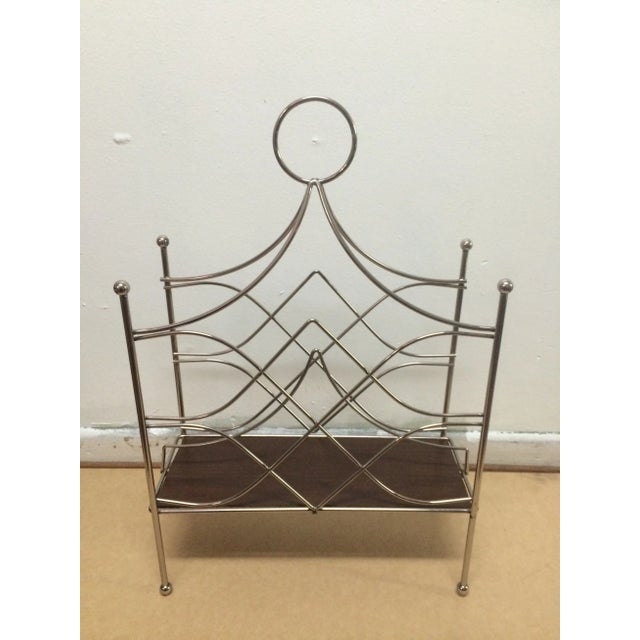 This wired magazine rack has been nickel plated and polished, is in great condition.