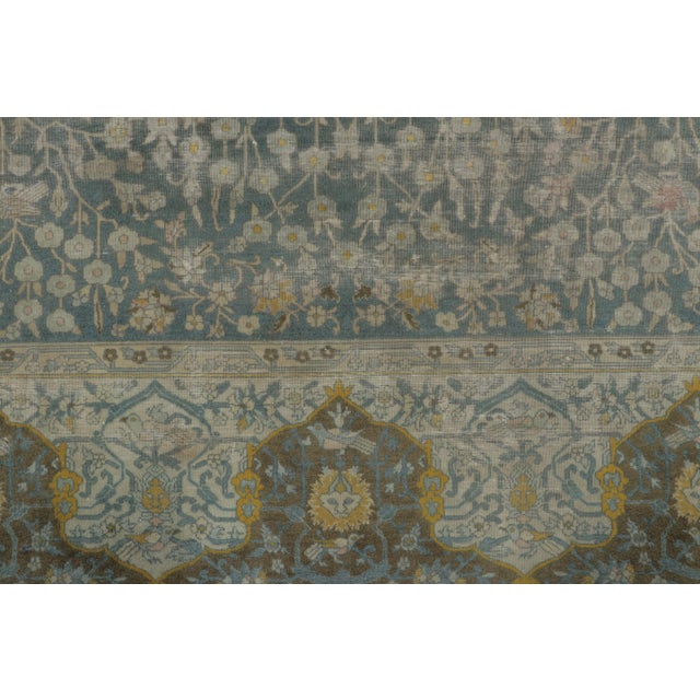 Hand-knotted in wool circa 1910-1920, this oversized 11x14 Indo-Persian rug from India joins Rug & Kilim’s extensive...
