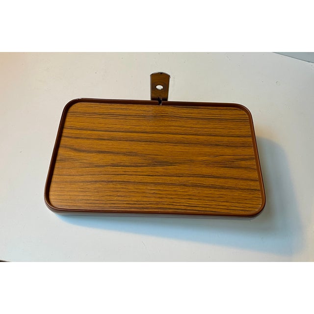A Scandinavian hospital floating bedside table in faux wood veneer, plastic, linoleum and chrome-plated steel. Very...