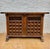 Elegant Spanish Renaissance Revival credenza crafted in solid wood, dating from the 20th century. The front features two...