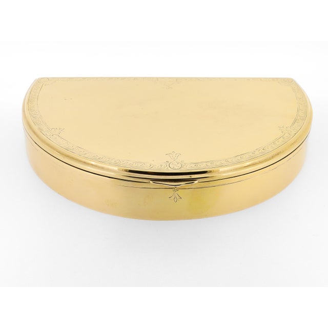 A fine antique American gilt silver box. By Gorham Manufacturing Co. In gilt sterling silver. In a very rare, half-round...