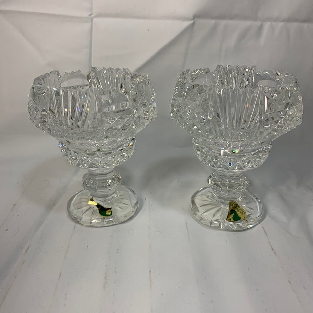Elevate your home decor with this exquisite pair of authentic, vintage Waterford Crystal miniature pedestal bowls....