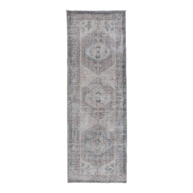 Vintage Persian Heriz Distressed Rug With Muted Colors & Medallion Design For Sale