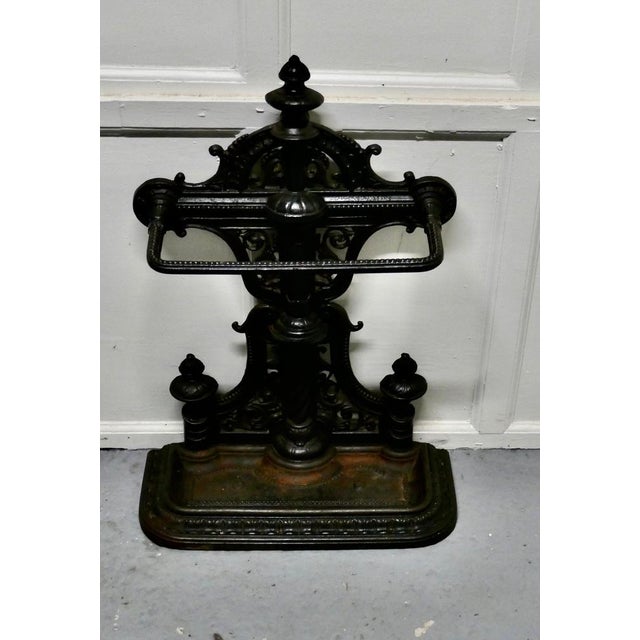 Large cast iron umbrella stick stand. An exceptional quality and attractive 19th century cast iron hall stand. This ornate...