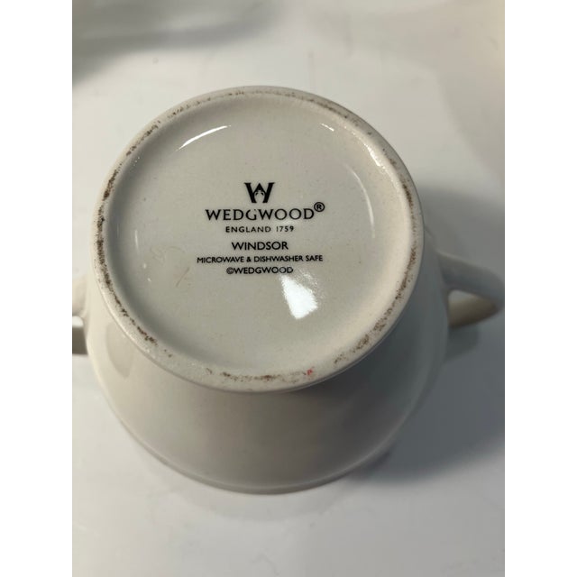 The Wedgwood style is Windsor It appears the set was never used 4 cup teapot Teapot L 9.5, W6, H 7.5 Creamer L5, w3.5, H4...