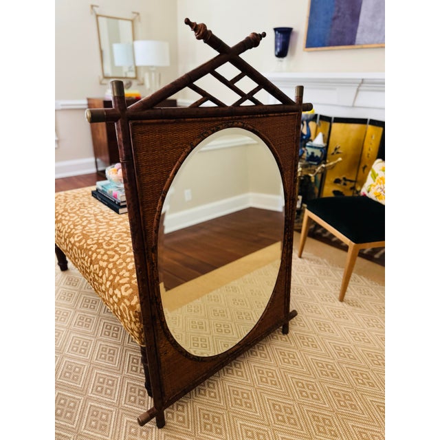 Amazing mirror! Beautiful bamboo and grasscloth with brass details. This mirror is in wonderful condition. It is large and...