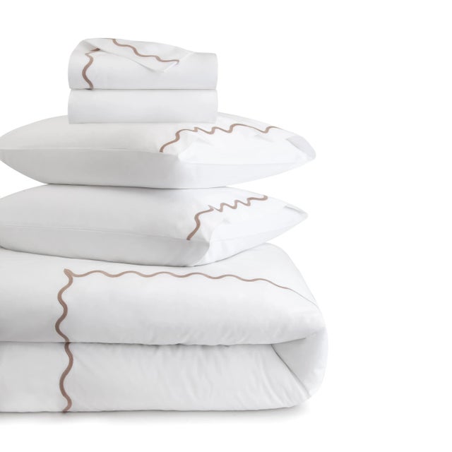 Elevate your sleep experience with this playful-meets-sophisticated duvet cover. Crafted from our signature blend of...