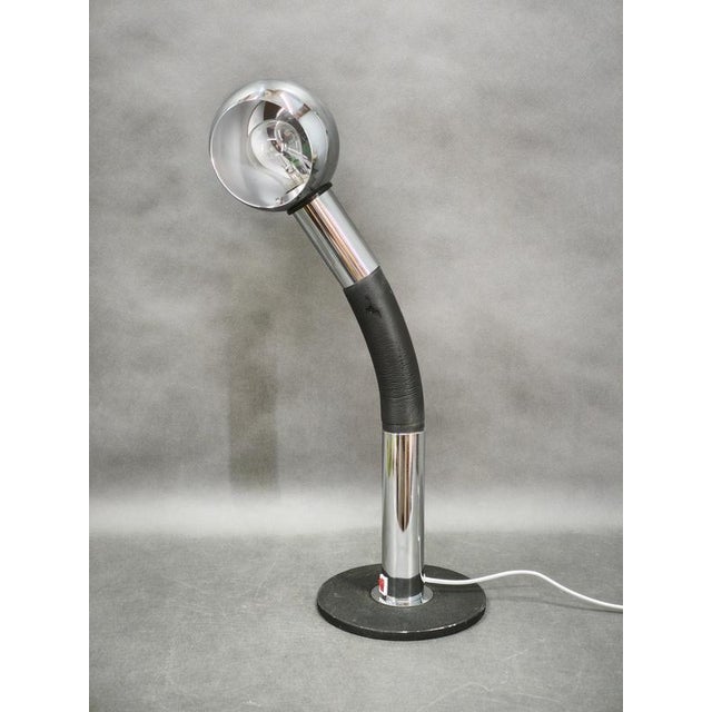 Sculptural “elbow” table lamp designed by e. Bellini for targetti sankey, italy, circa 1970s. An expressive example of...