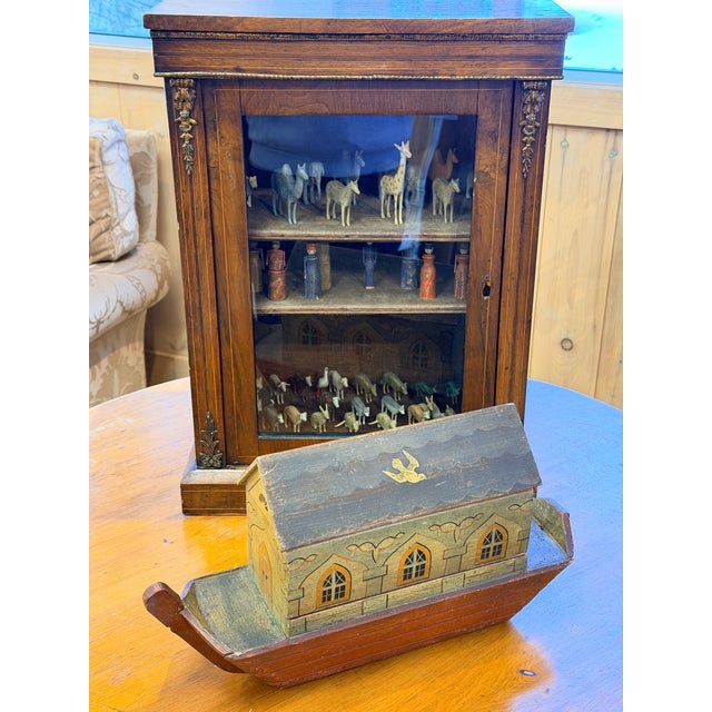 This is a rare and highly authentic 19th century Noah’s Ark, crafted in wood and accompanied by an exceptional collection...