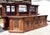 Monumental Carved Oak Front and Back Bar An impressive carved oak front and back bar, designed in the Victorian taste and...