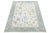 This Modern Oushak Style Wool Rug combines a contemporary flair with traditional Oushak artistry. It showcases a soft...