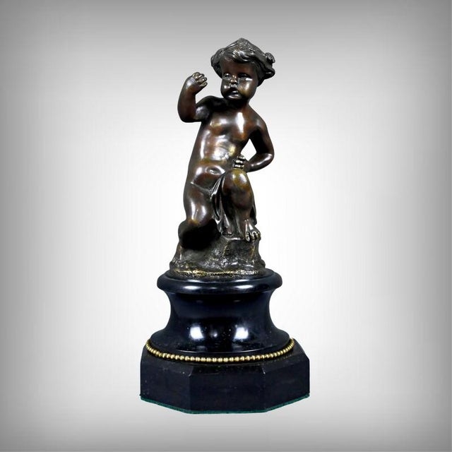 This charming pair of bronze putti with a brown patina embodies all the decorative refinement of the 19th century, an era...
