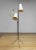 A striking floor lamp designed by Svend Aage Holm Sørensen, Sweden, in the 1950s. This elegant piece features three...