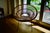 Composed of a natural rattan structure suitable for indoor use as well as on a covered terrace, with black metal legs in...