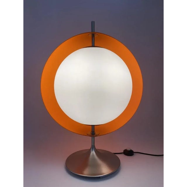 Ball lamp *Large, satin glass ball (36 cm) with a spherical umbrella made of orange plastic that can be rotated around the...