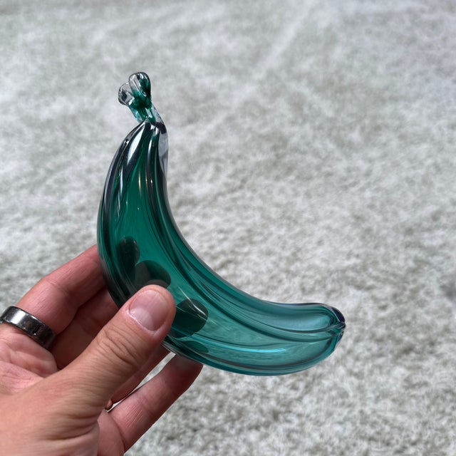 Design Plus Gallery presents an Art Glass Sculpture of an Iridescent Banana. This is likely vintage Italian Murano, and it...