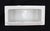 Flush mount rectangular bathroom soap dish made of white porcelain over ceramic. Good condition with surface wear and...