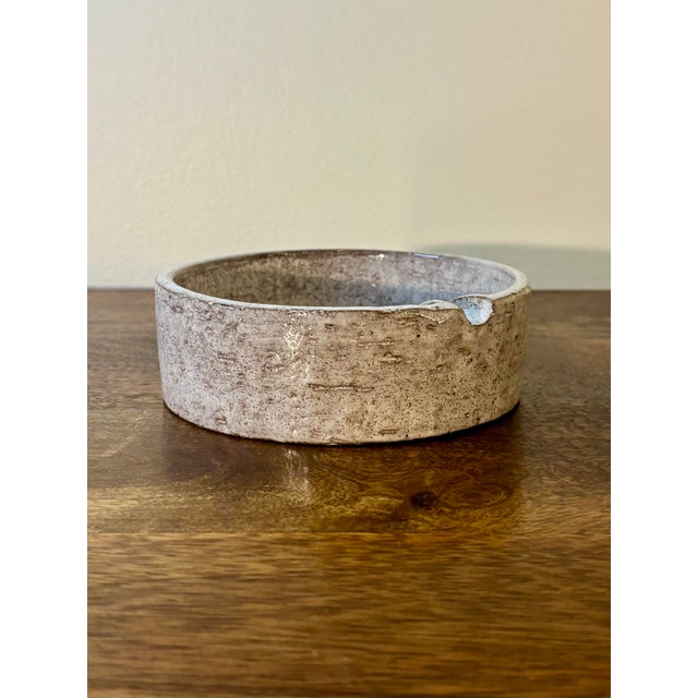 A charming early ceramic ashtray designed by Aldo Londi and handcrafted in Italy during the 1950s. Finished in a warm...