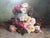 Large and very beautiful antique oil painting on canvas, still life, depicting a generous bouquet of roses placed on a...