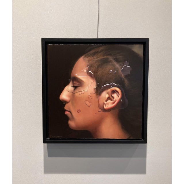 The Calling presents a striking profile of a figure, captured in a moment of introspection. The interplay of smooth skin...