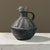 Abstract Ex-Museum Pre-Columbian Chimú Blackware Anthropomorphic Vessel With Handle For Sale - Image 3 of 7