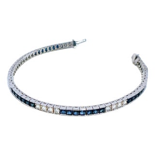 Platinum Diamond and Blue Sapphire Tennis Bracelet For Sale
