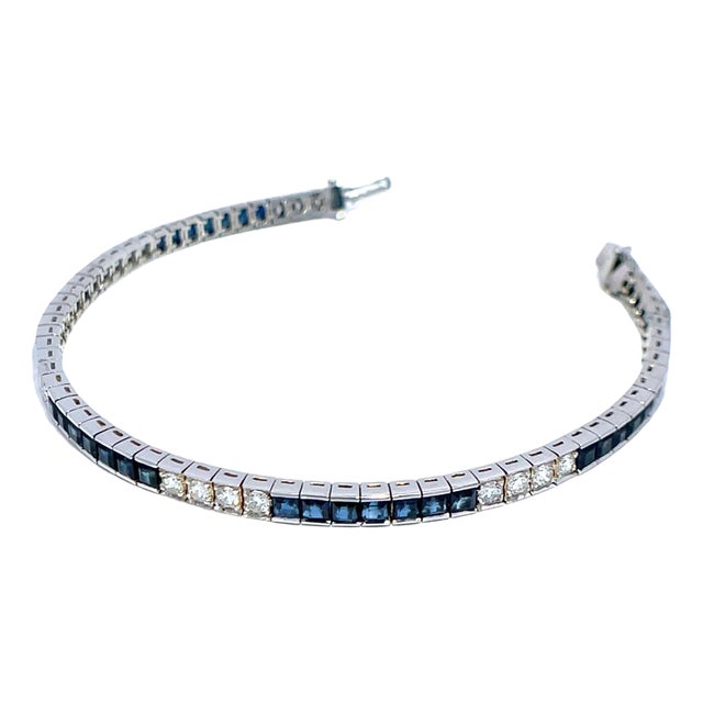 Platinum Diamond and Blue Sapphire Tennis Bracelet For Sale