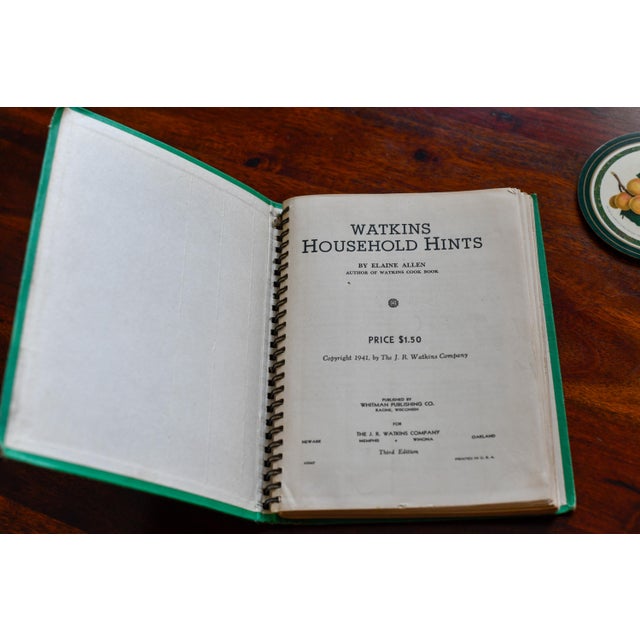 This 246-page guide by Elaine Allen published by The J.R. Watkins Company, offering vintage tips on laundry, cleaning,...