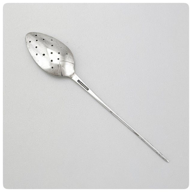 Provenance: Gebelein to Charles Williams, 1975 A mote spoon is a small, specialized utensil historically used to remove...