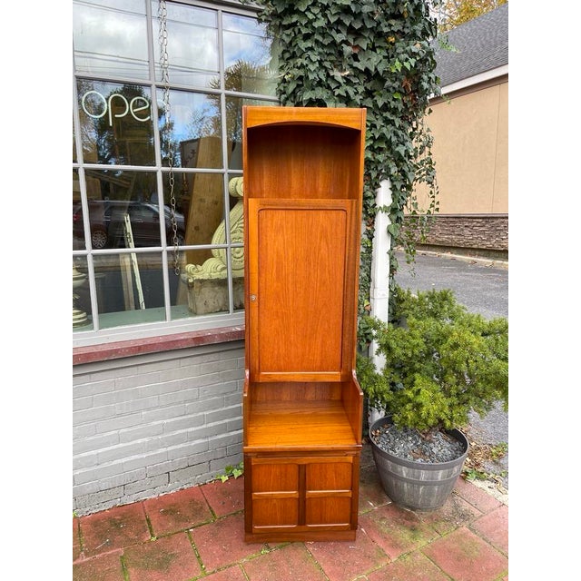A stylish and functional Nathan Furniture drinks cabinet, this beautifully crafted teak unit features a mirror-backed...