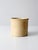 This antique stoneware crock features a simple cylindrical form with a substantial rolled rim and a warm cream-colored...