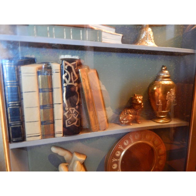 If 'kitschy' makes you smile, here comes a BIG grin. Made entirely of plastic is this faux shadowbox (or hanging curio...